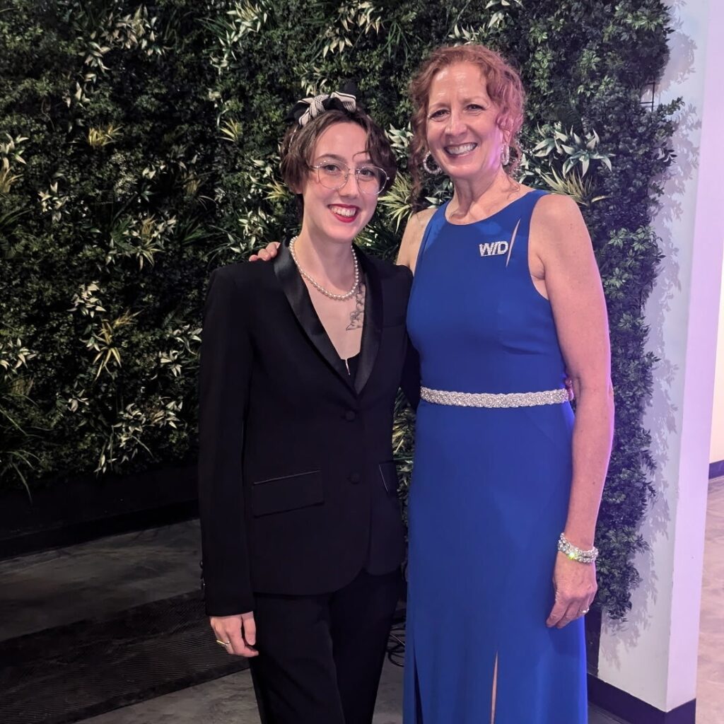 WID MI's Maura Rylander poses with a scholarship recipient